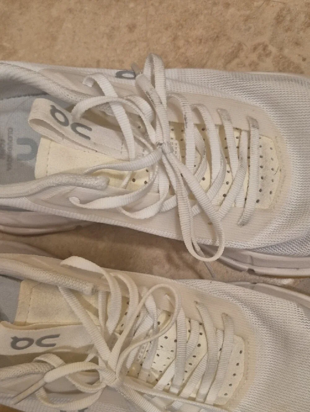 On Running Women's White Athletic Sneakers with Yellow Outsole Accents